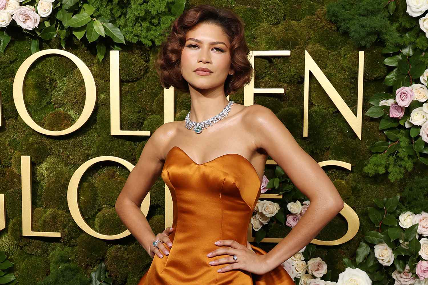 Zendaya wearing a transparent crystallized Valentino gown at the 2025 Vanity Fair Oscar Party
